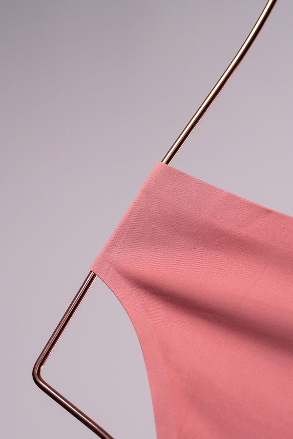 Close-up of a dusty pink brief