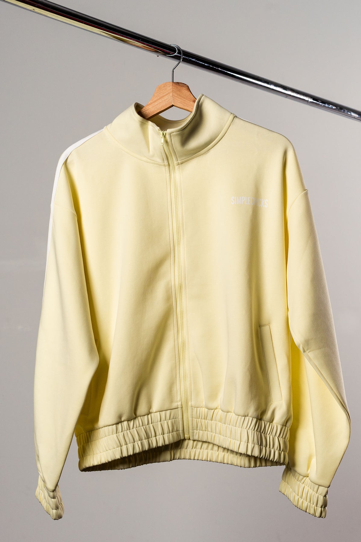 Lemon loungewear jacket on a hanger