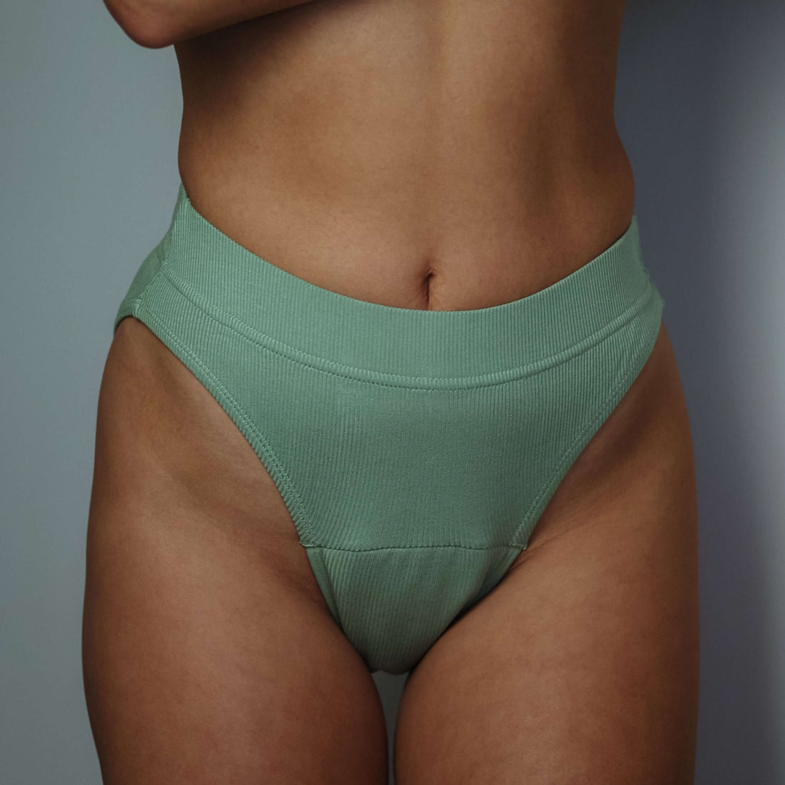 Green high-leg period underwear by Simplechicks offering comfort and eco-friendly protection.